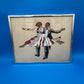 Vintage Mid Century Dancing Couple Art Reverse Painted Glass Art Deco Chrome Frame