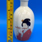 Vintage Japanese Porcelain Sake Bottle Vase Geisha Woman Playing Flute Signed 5”
